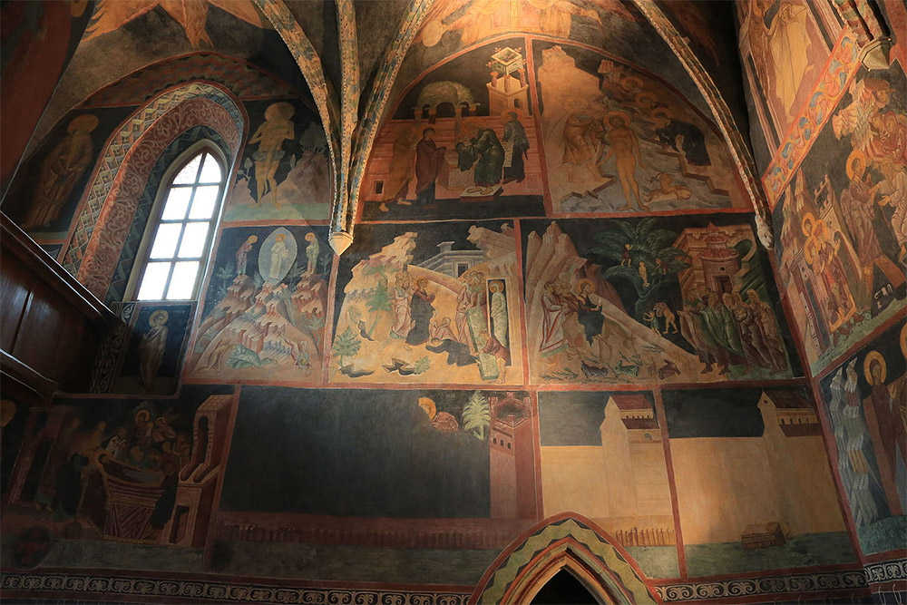 Byzantine-style frescoes covering the walls and vaults of the Trinity Chapel in Lublin